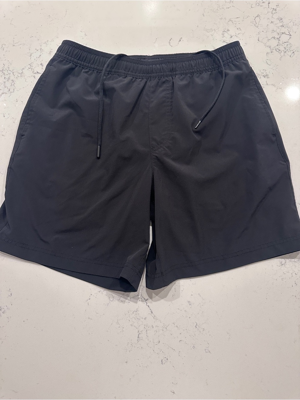 chubbies Black Lined Hybrid Athletic Shorts 7”